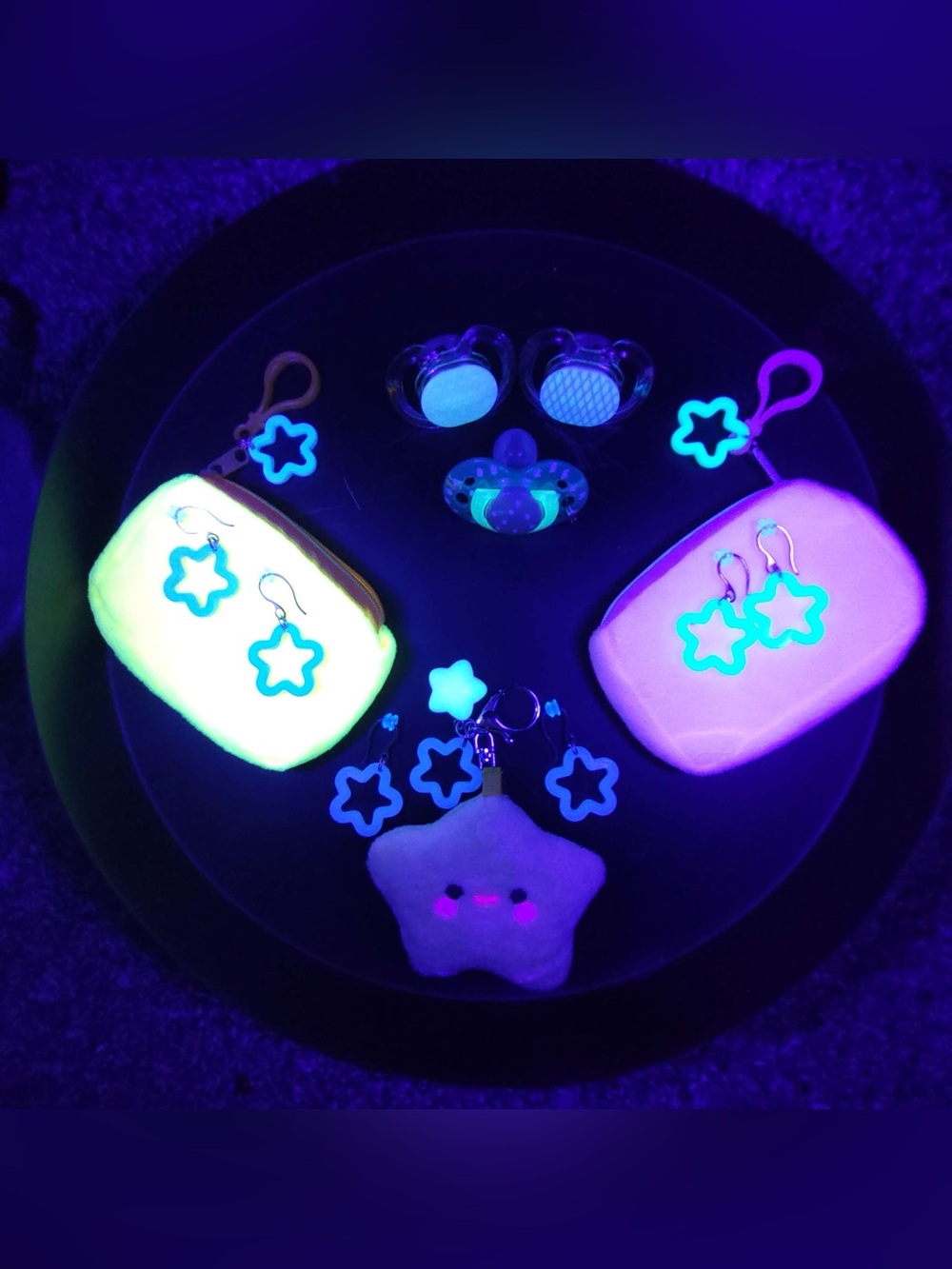 Rave festival earrings & bags, binkies, plush bag charms.